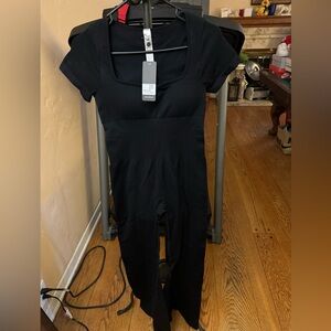 Black M tummy control flared jump suit. Shape wear. Multi use. Gym attire.
